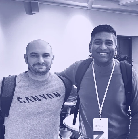 Suganthan with Andy Crestodina at a conference